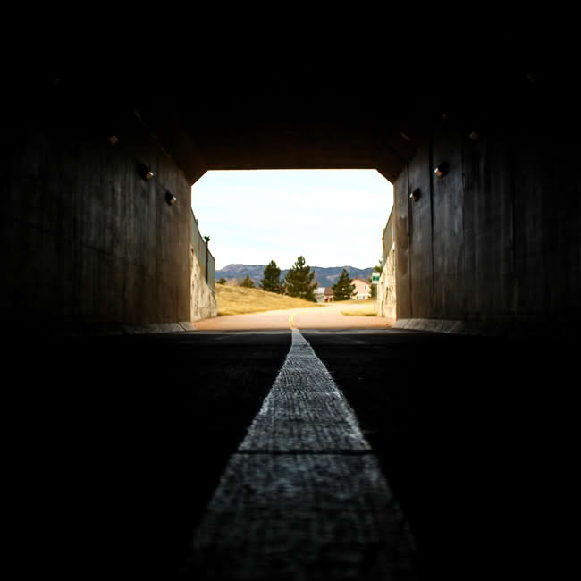 Cyclist riding through the extensive local bike trail network in Fort Collins