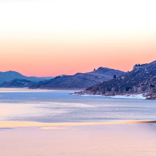 Sunset over Horsetooth Reservoir, a major geographic landmark in Fort Collins, Colorado